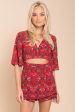 Casey Peek A Boo Floral Romper Red For Sale